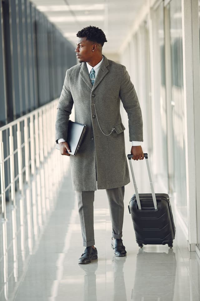 Business traveler moving through an airport terminal